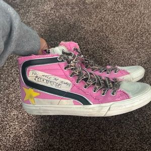 golden goose pink,black, and white slide model